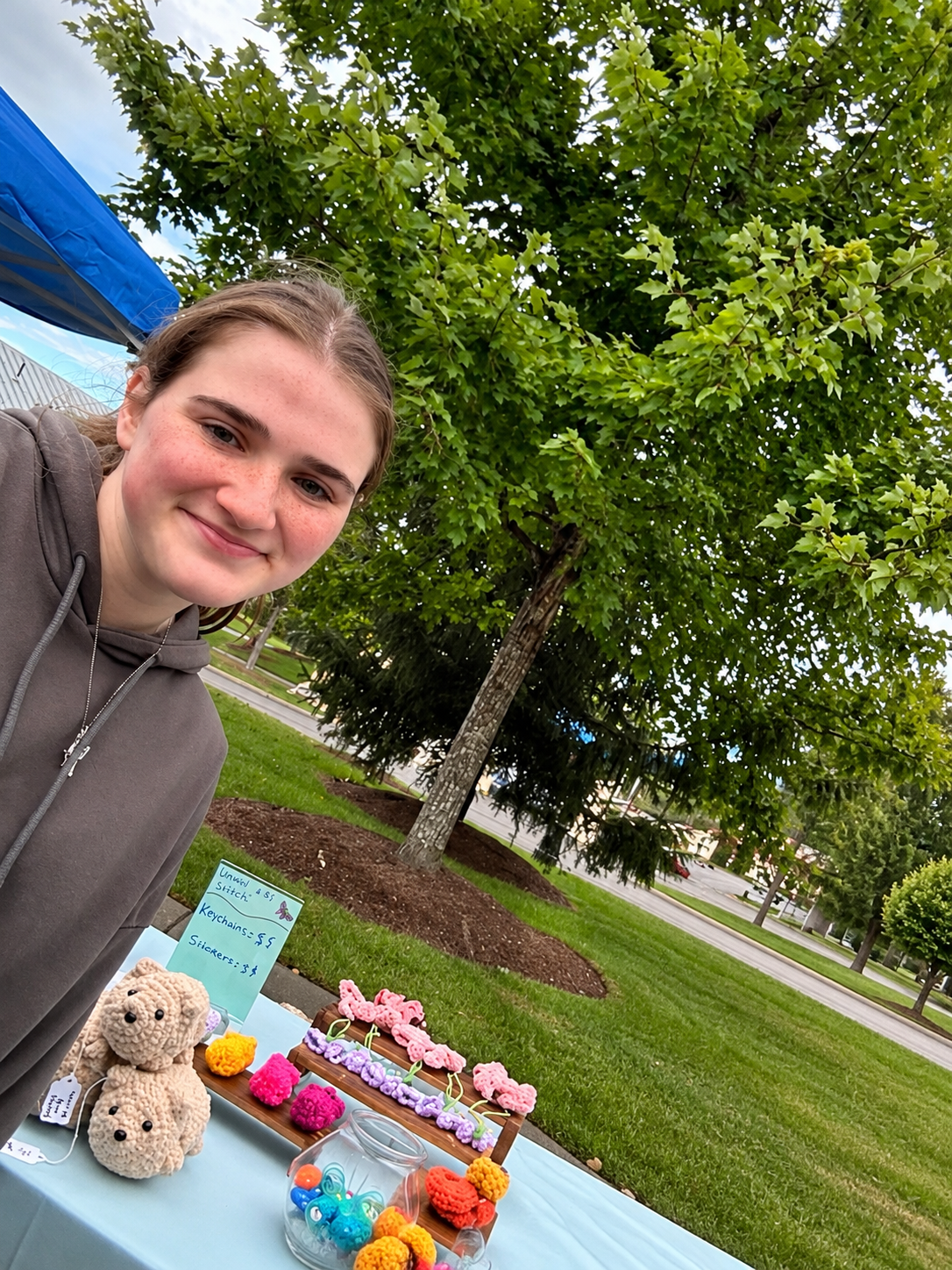 The maker at a craft fair booth
